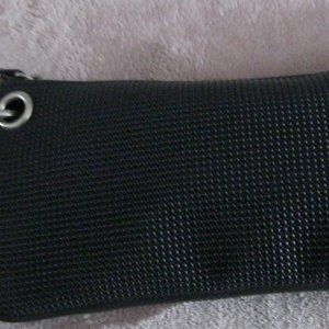 "VINTAGE CLUTCH PURSE MADE FROM OLD BLACK TIRES-LOTS OF STORAGE SPACE INSIDE"